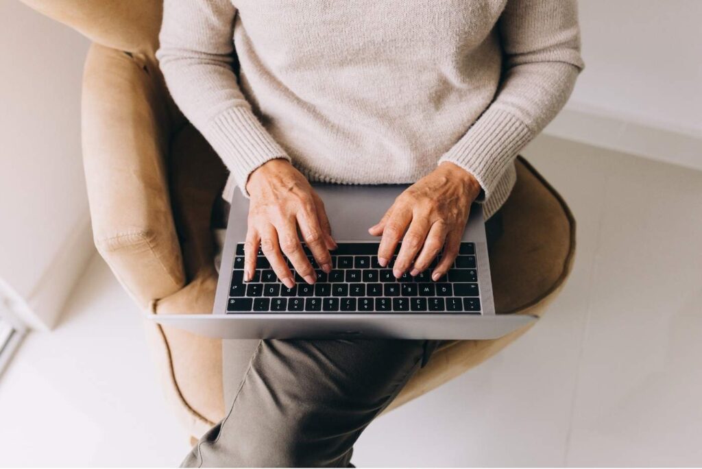 woman using laptop at home